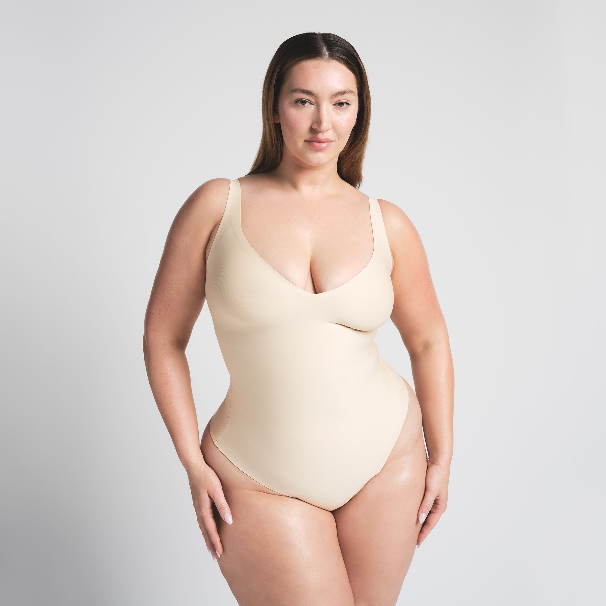 UNLINED PLUNGE THONG BODYSUIT
