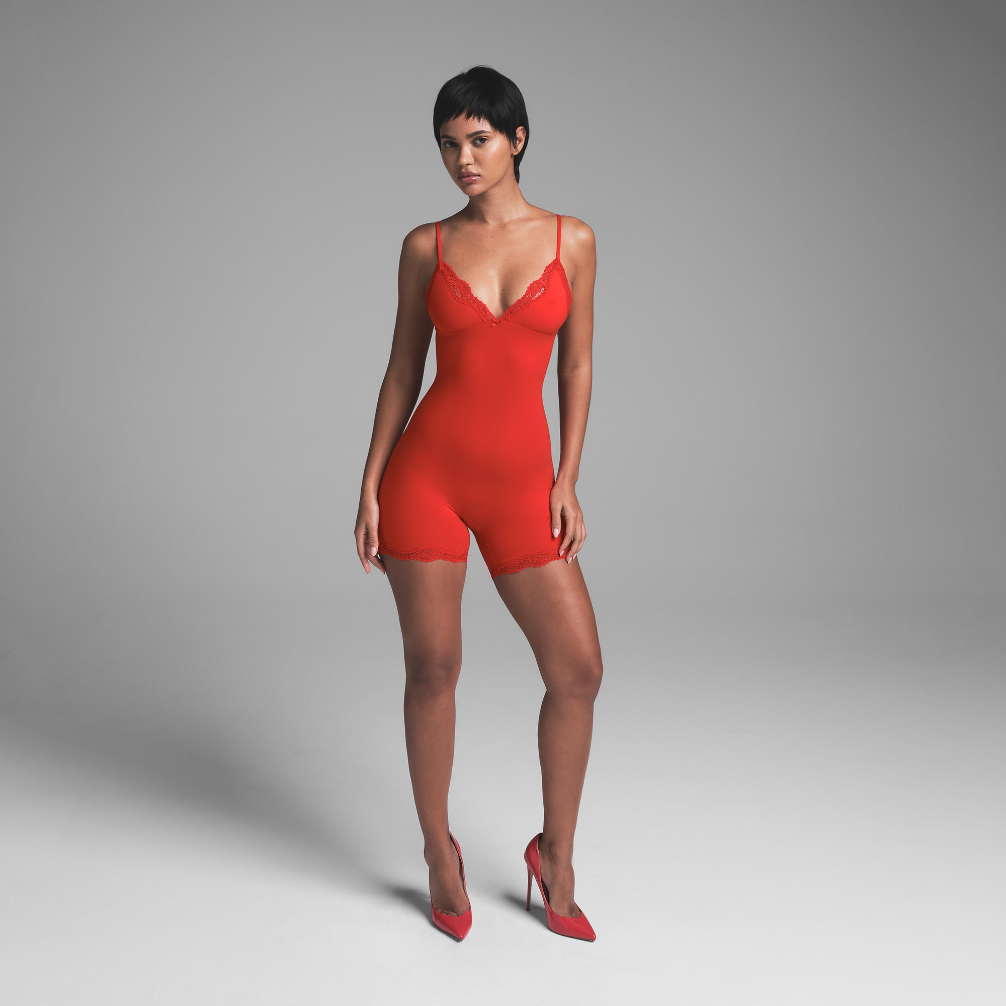 TRIANGLE ONESIE